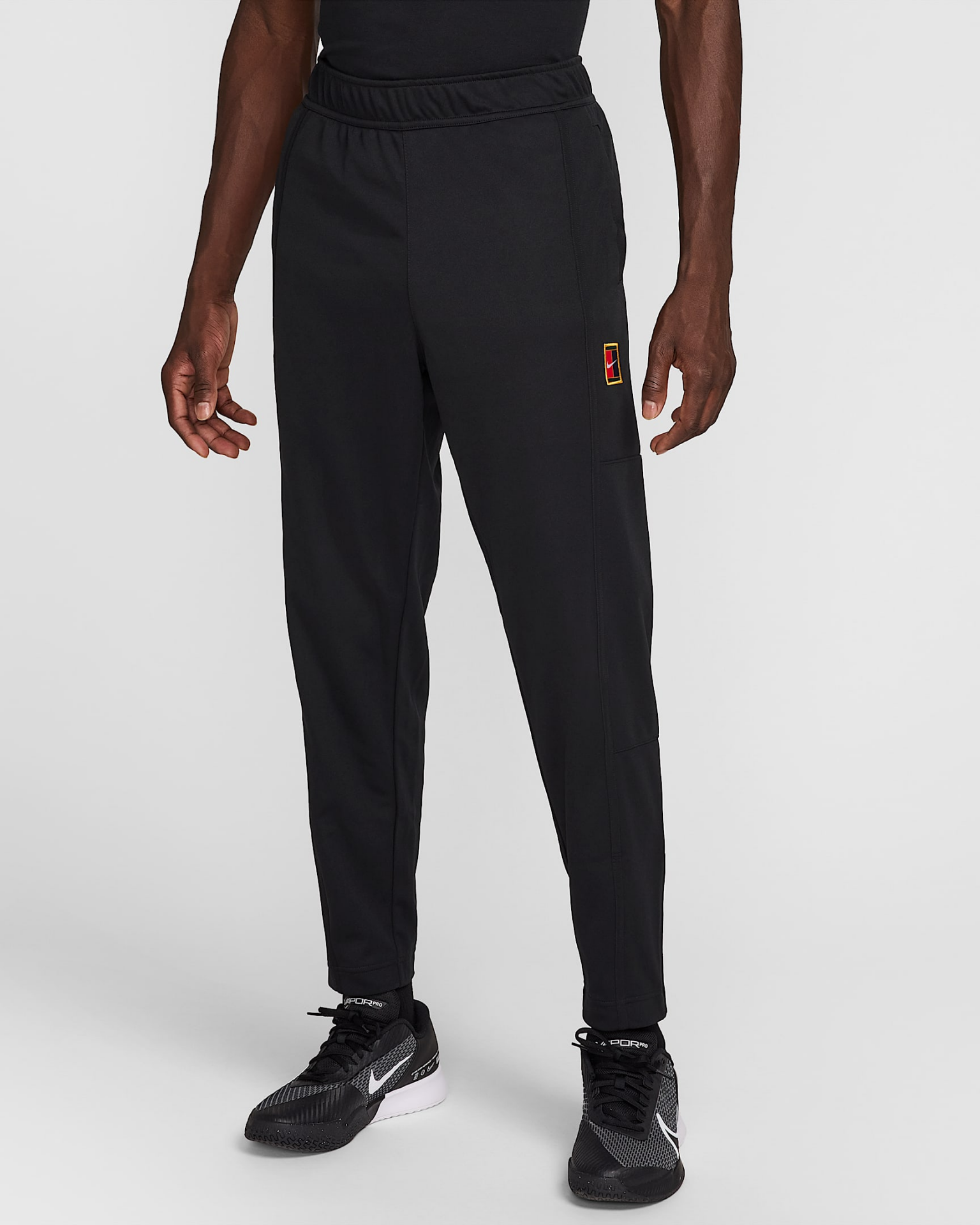NikeCourt Heritage Erkek Tenis Eşofman Altı